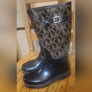 Michael Kors tall black and brown rain boots.
